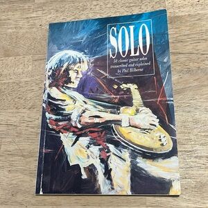 SOLO 50 Classic Guitar Solos Transcribed and Explained by Phil Hilborne